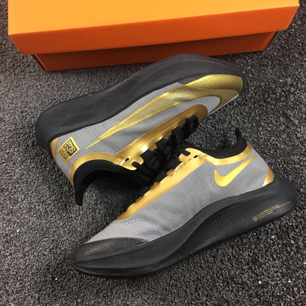 nike zoom fly 3 black gold