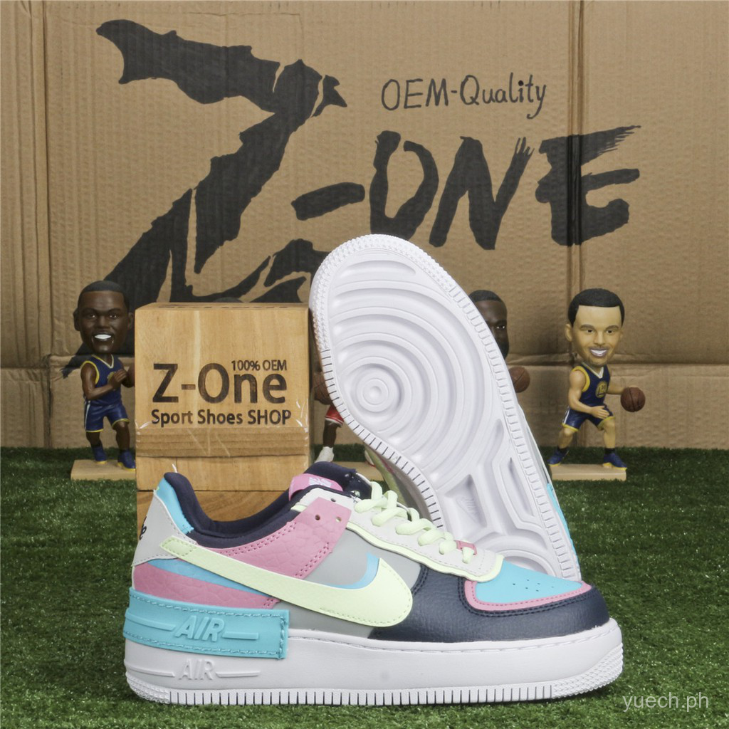 pink and green nike sneakers