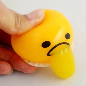 squishy puking egg yolk stress ball