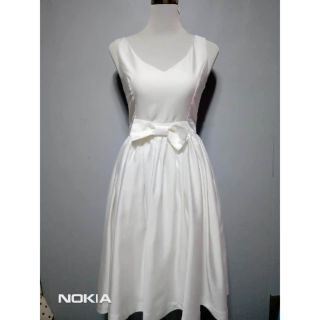 white sleeveless gown