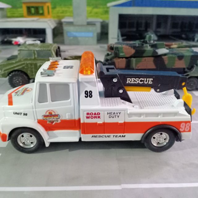 toy tow truck with car
