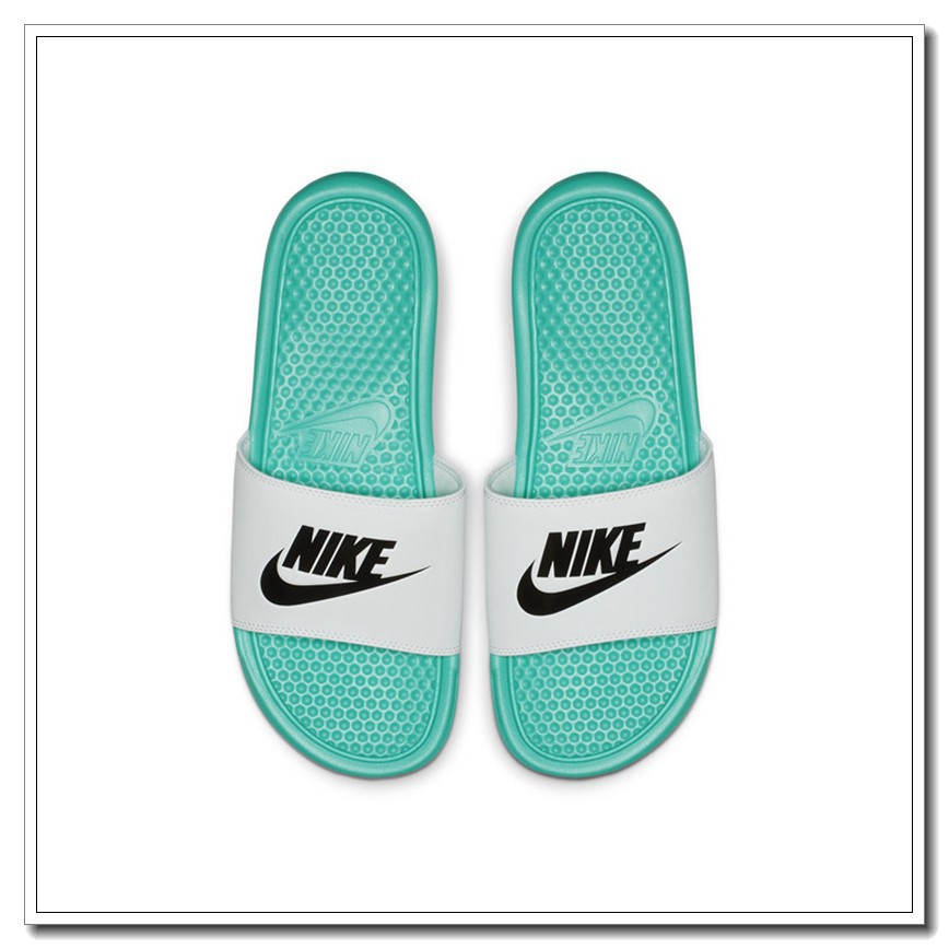 blue and white nike flip flops