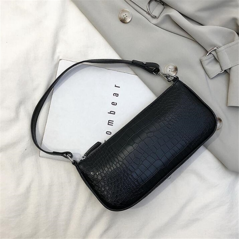 small shoulder bag with short strap