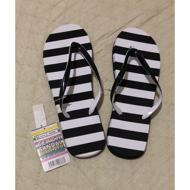 white beach slippers