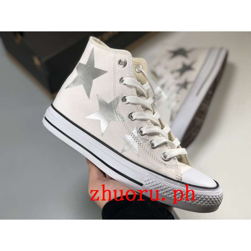 silver high top shoes