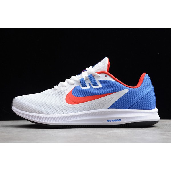 white and blue nike running shoes