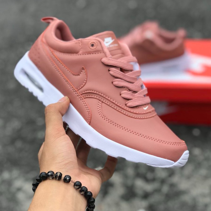 nude pink nike shoes