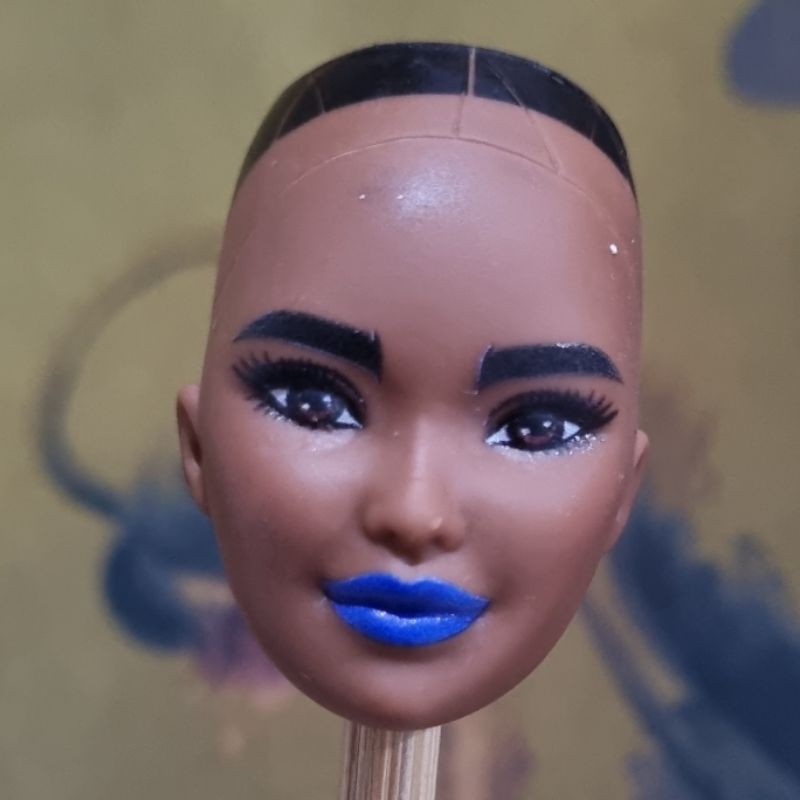 Headed doll bald barbie Matell unveils