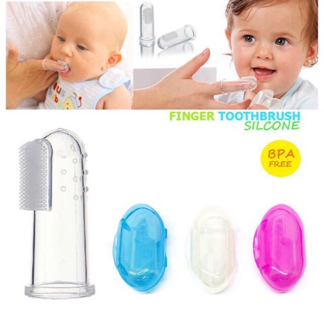 baby with toothbrush