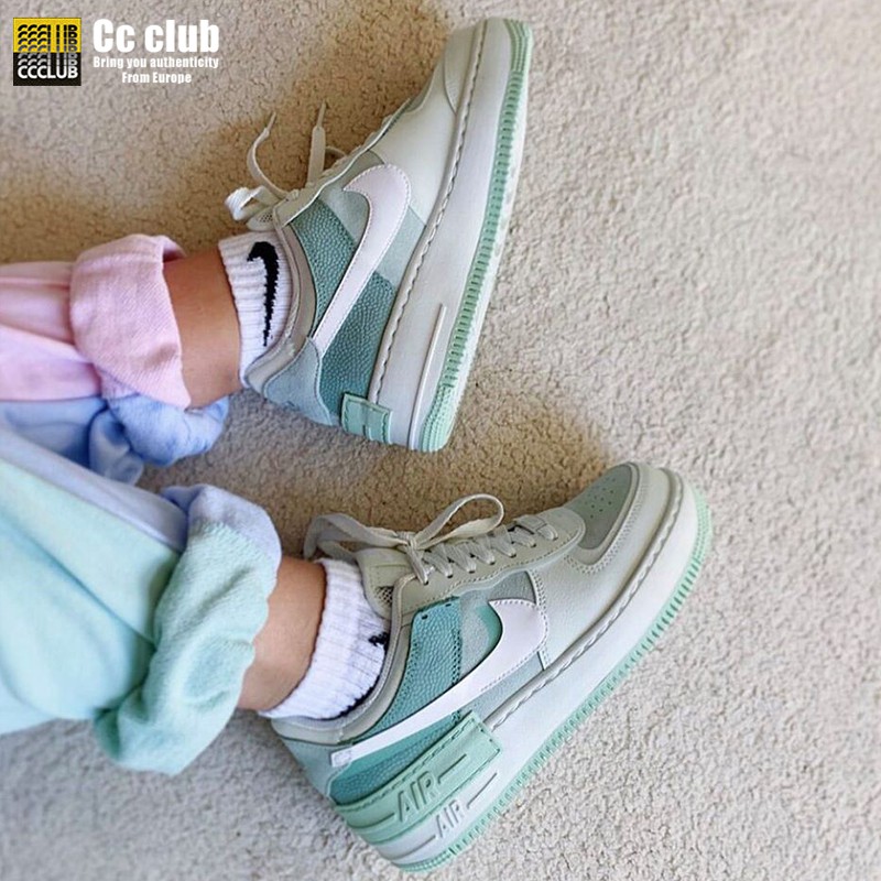 light green nike sneakers