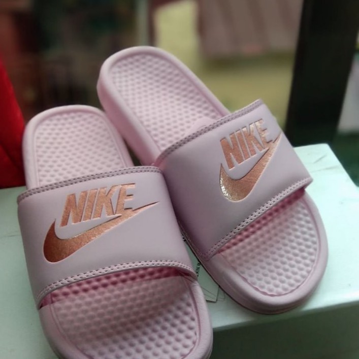 pink nike slippers