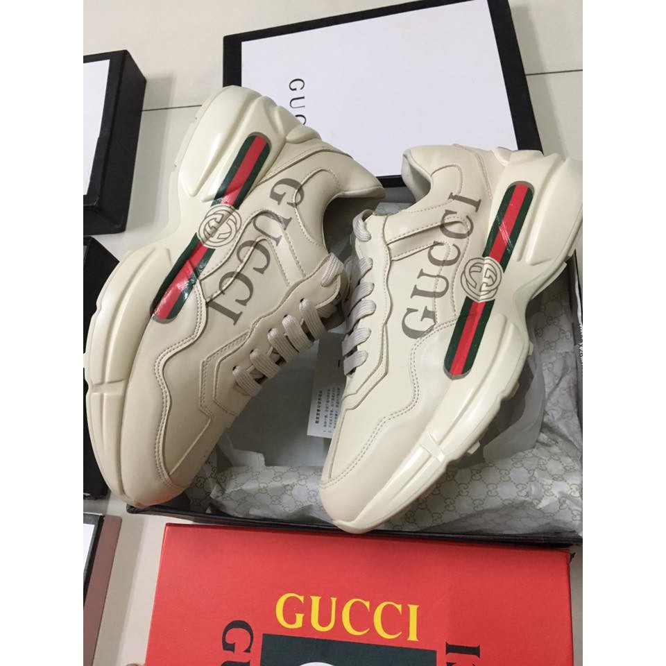 rhyton gucci logo leather