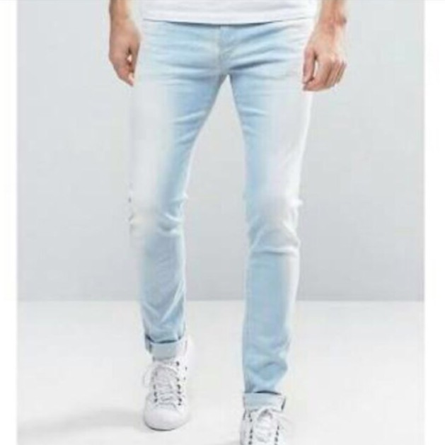 guys wearing light blue jeans