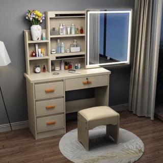 white desk with mirror and lights
