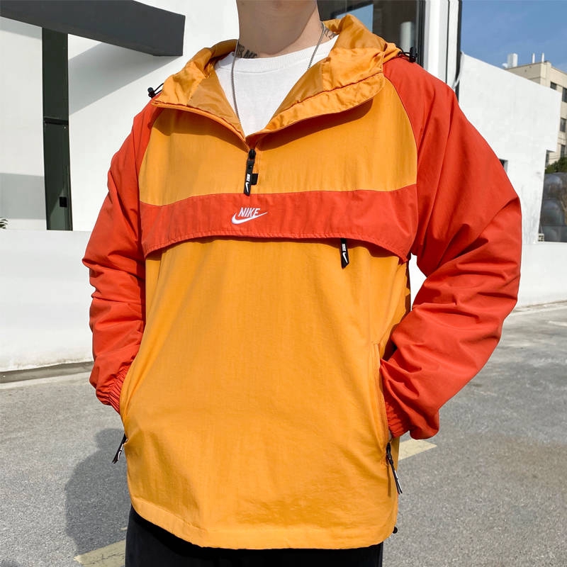 red and orange nike windbreaker