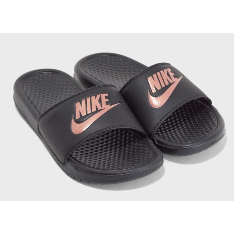 black and gold nike slides womens