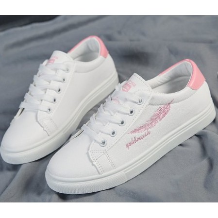 white sports shoes for women