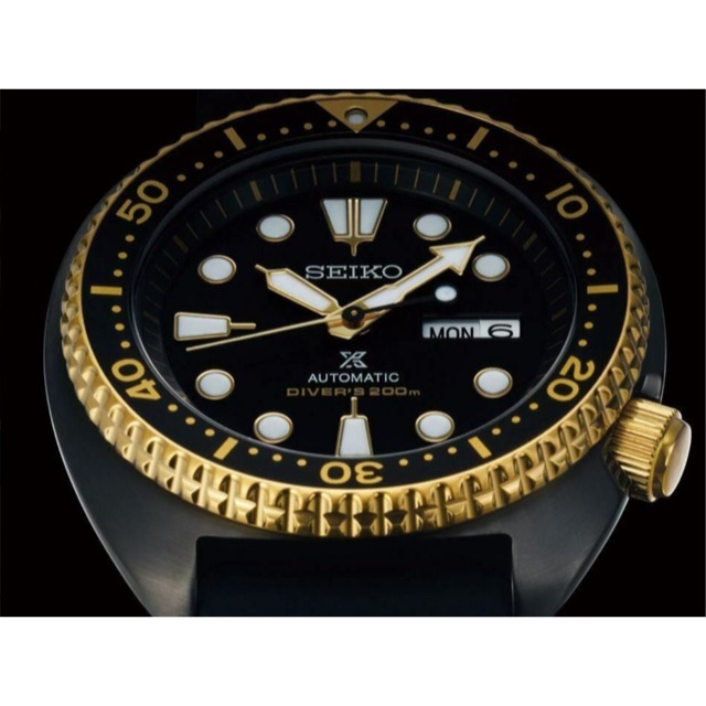 black gold seiko watch