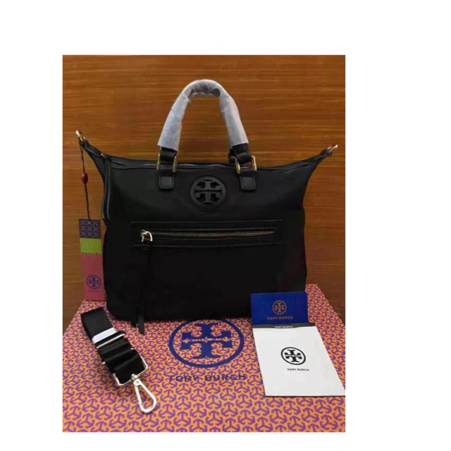 tory burch hand purse