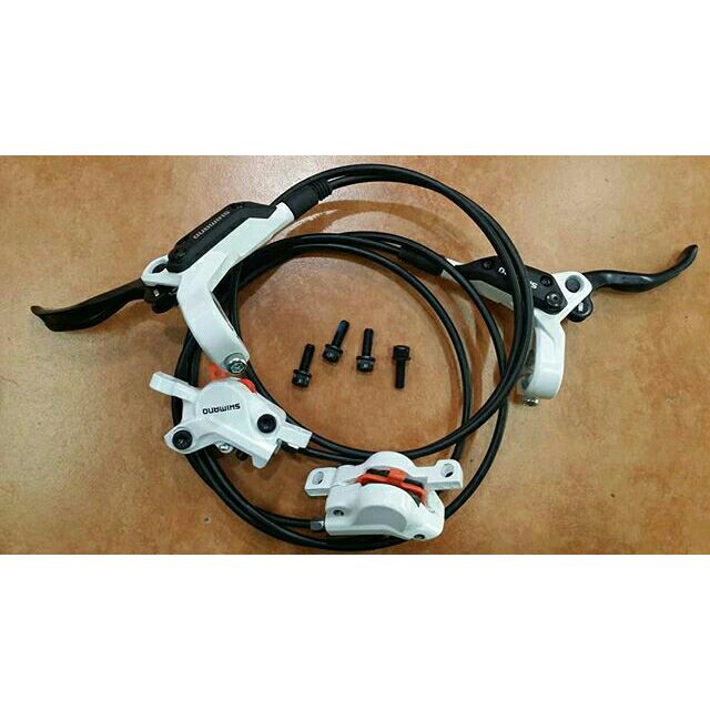 white shimano hydraulic brakes