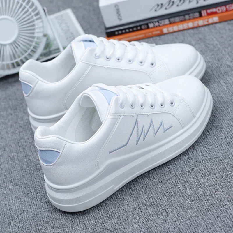 ladies white sports shoes