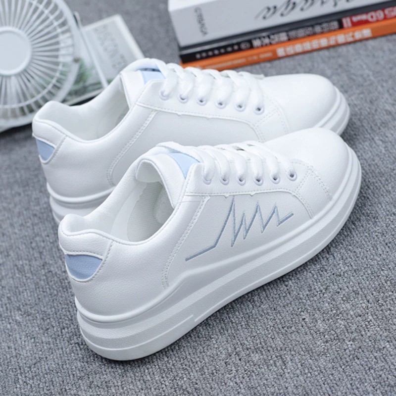 white sports shoes for women