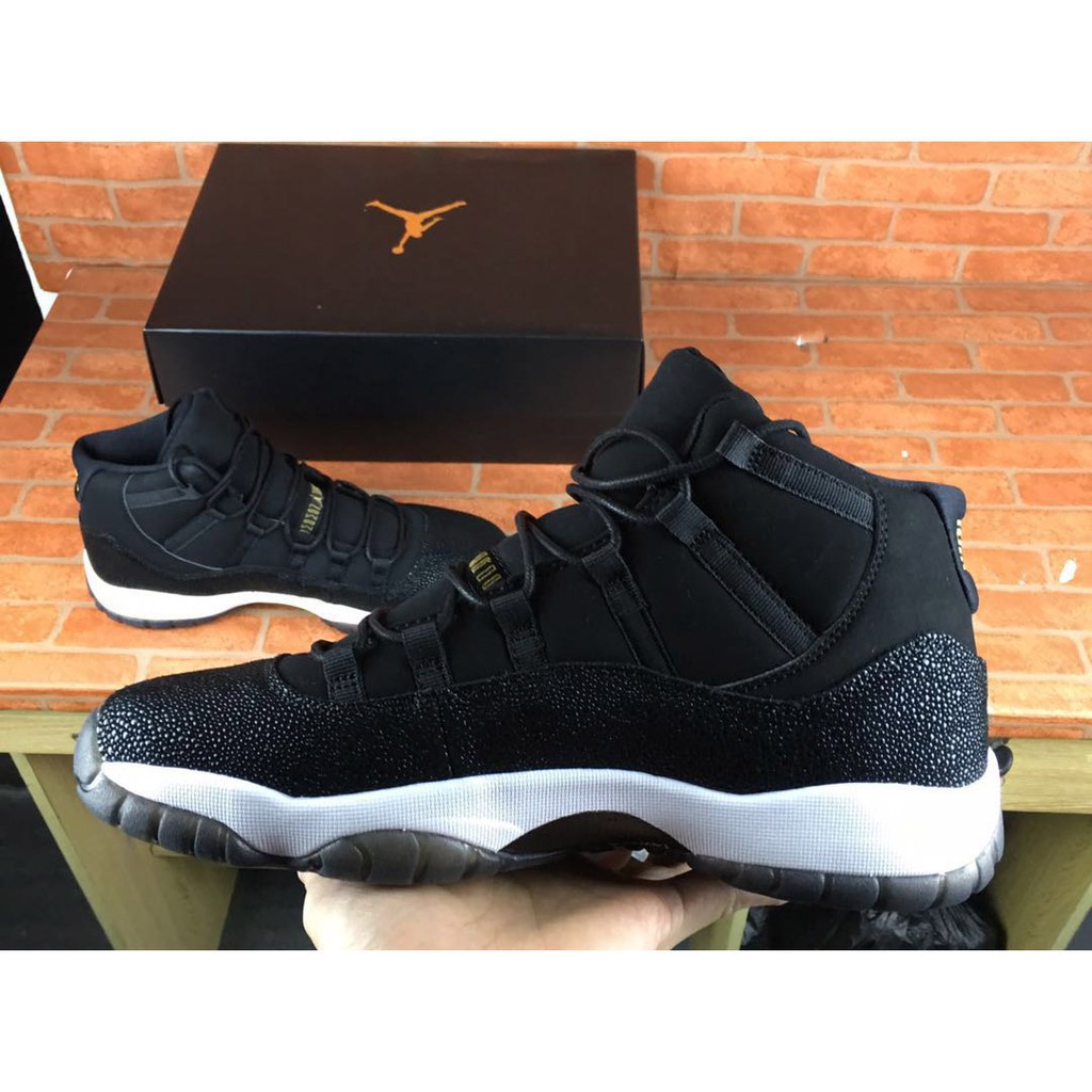 jordan 11 black and gold