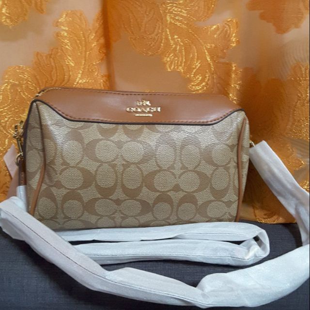 coach mini sling