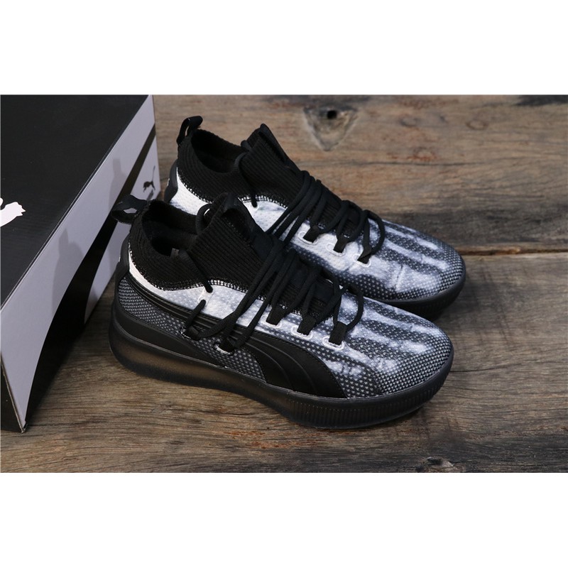 black puma basketball shoes