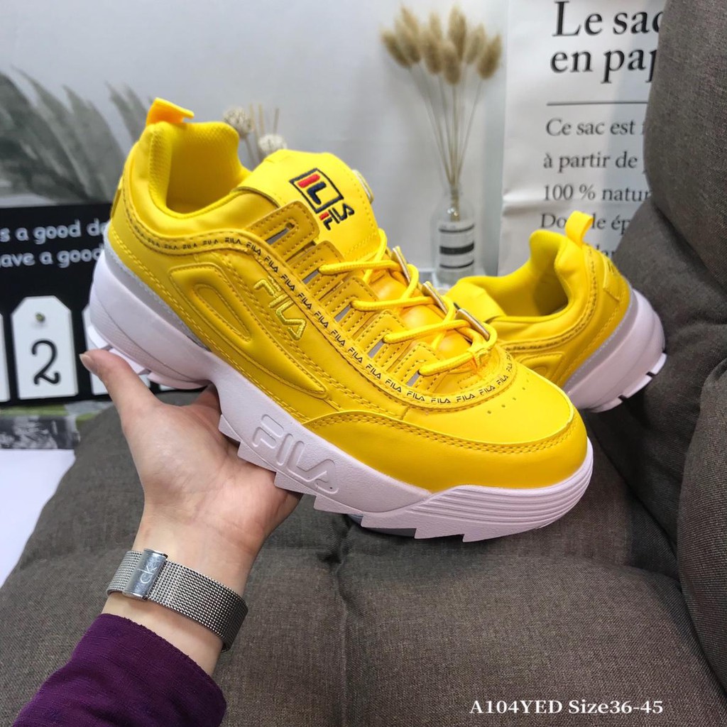 yellow fila shoes disruptor