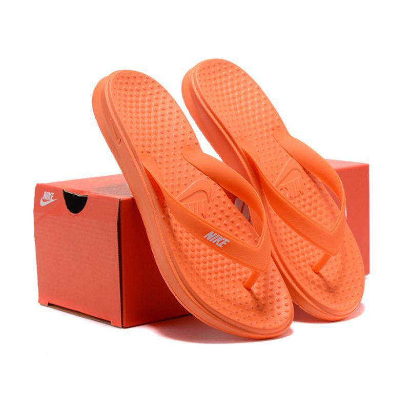 orange nike slippers