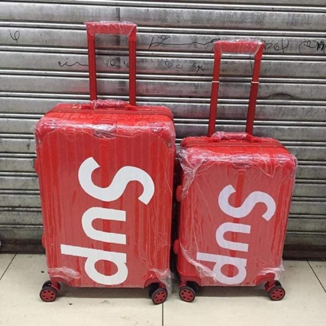 supreme suitcase price