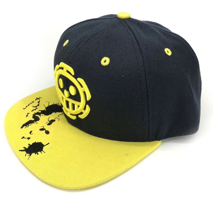 black and yellow baseball cap