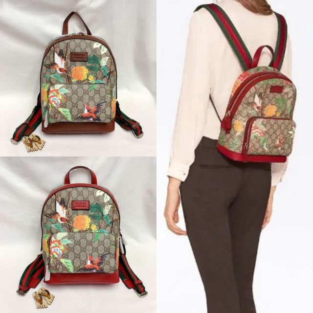 gucci supreme sling backpack