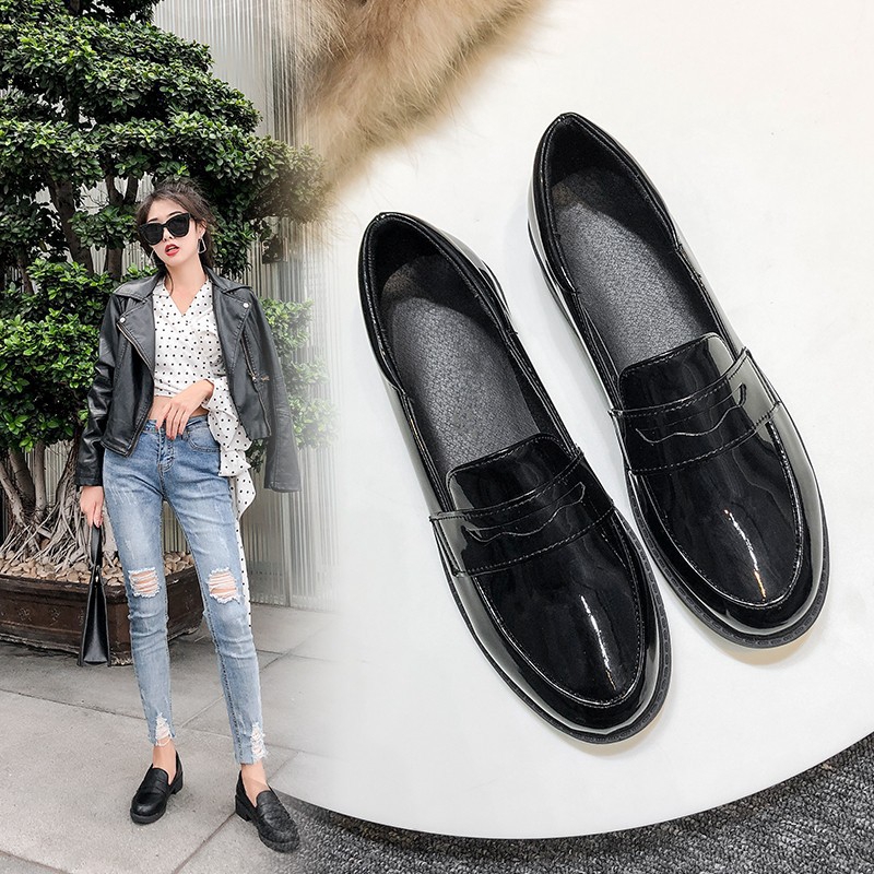 black tassel flats