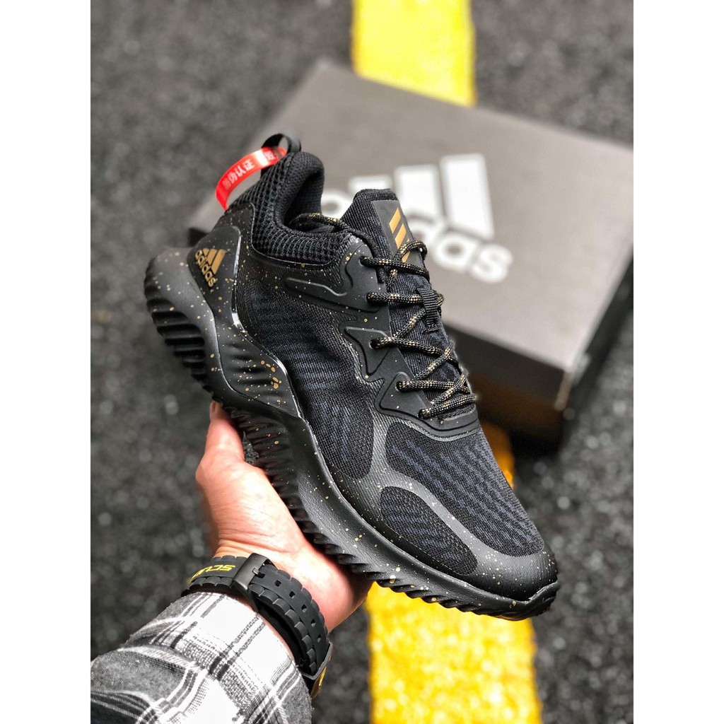 black and gold alphabounce