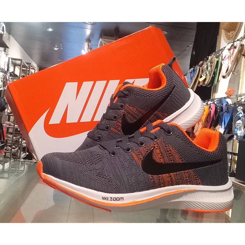 orange and gray sneakers