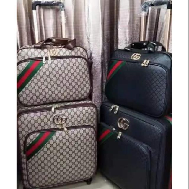gucci luggage bags
