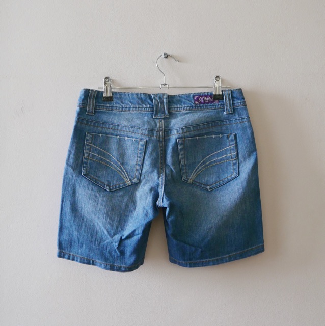 denim shorts above the knee
