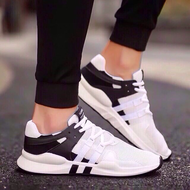 black and white rubber shoes
