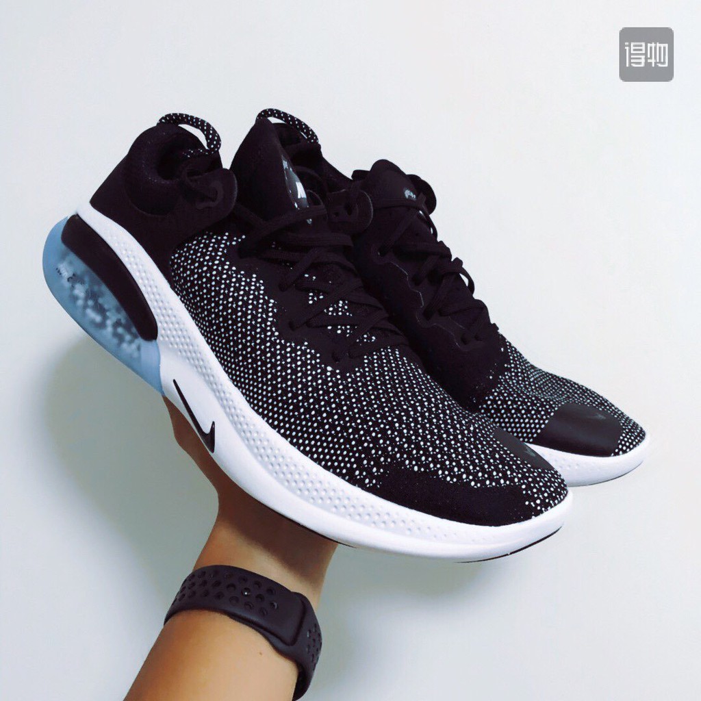 black white running shoes