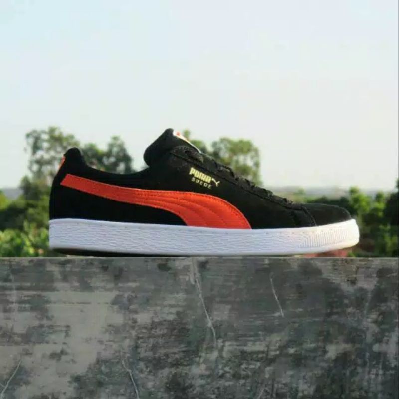 red black puma suede