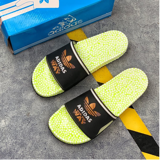 neon green adidas slides