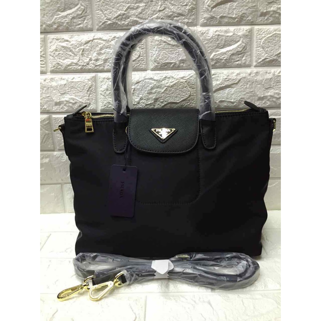 Prada authentic overrun hand bag with sling | Shopee Philippines