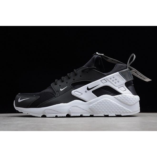 black and white huaraches with zipper