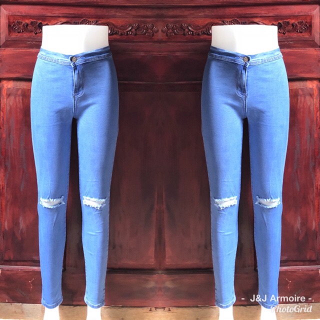 light blue knee ripped jeans