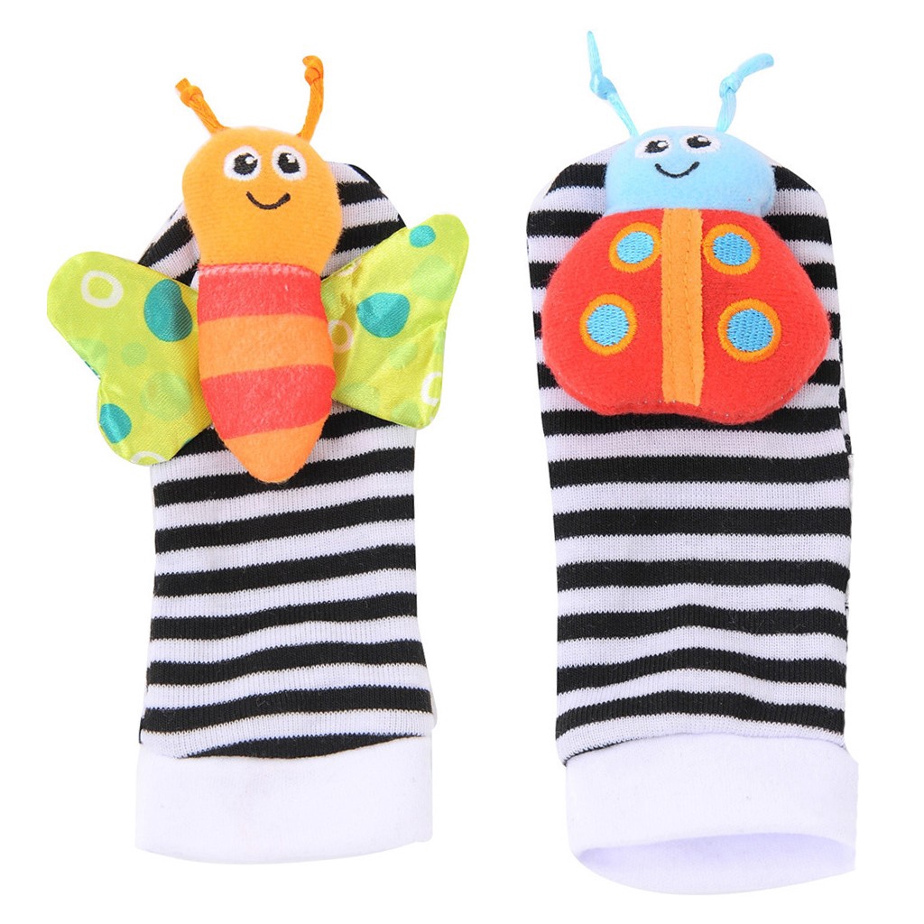 baby socks with toys on them