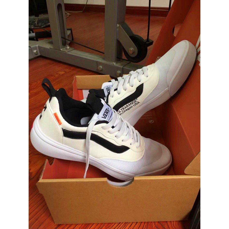 white vans running shoes