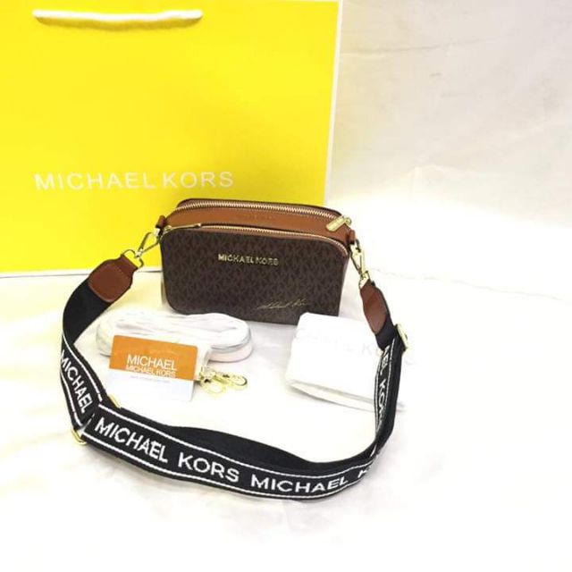 mk sling backpack