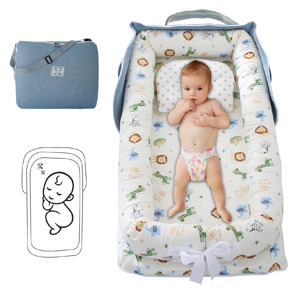 newborn sleeping on boppy lounger